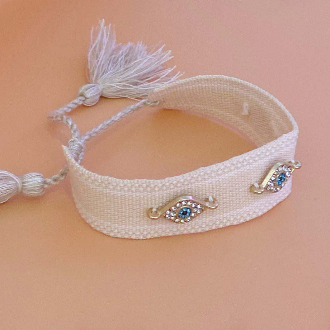 Pulsera tejida ojo turco color beige