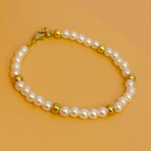 Pulsera bolitas perla / dorado